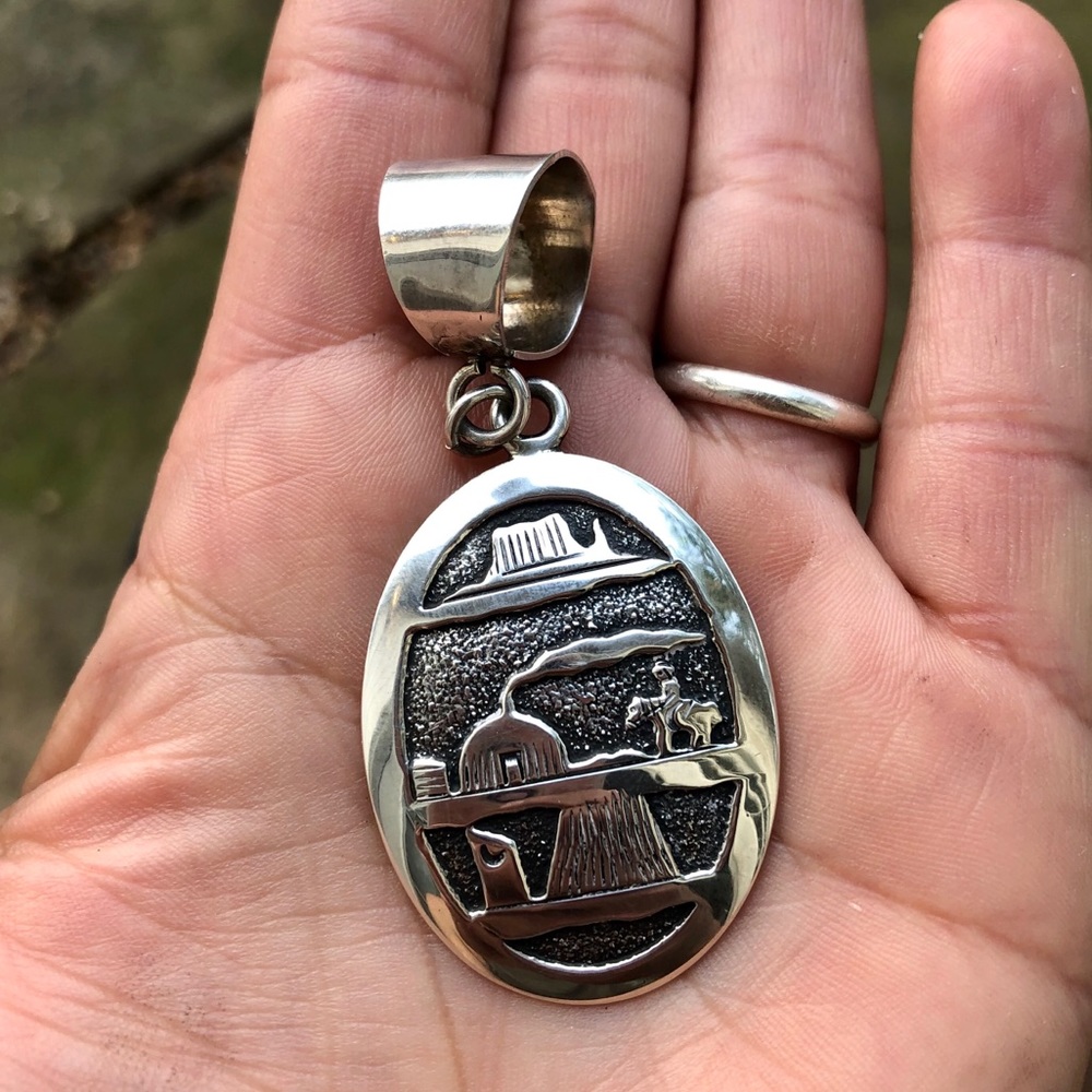 Native American Signed Story Teller Pendant